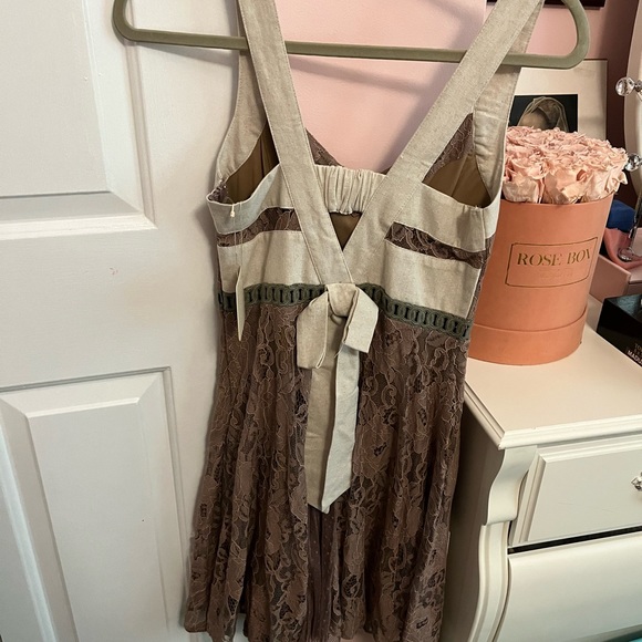 Lace fit-and-flare mini dress with crème straps and back tie detailing - Picture 2 of 3